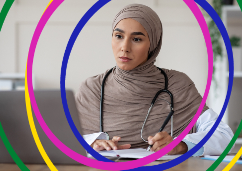An image of a doctor working on their laptop