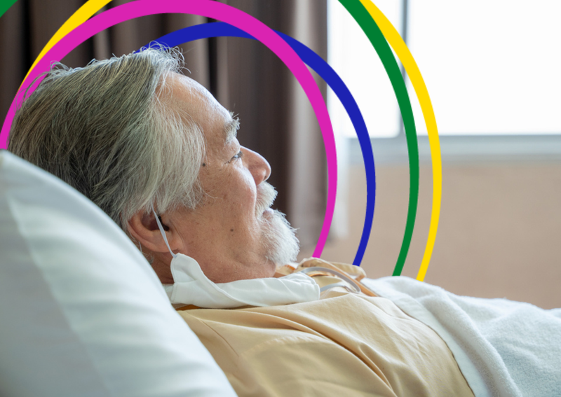 An image of an older person in bed